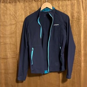 Patagonia Navy Blue Jacket with Teal Accents